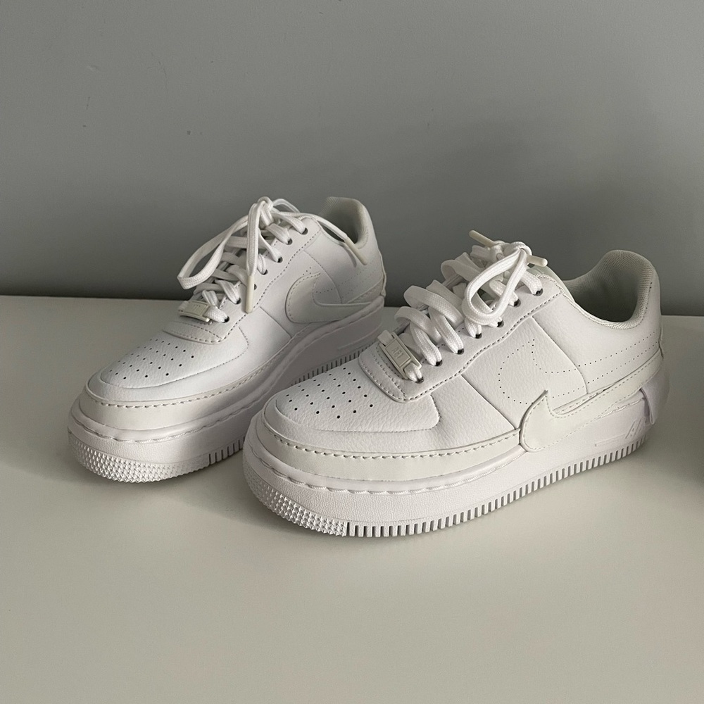 Nike white jester sneakers.